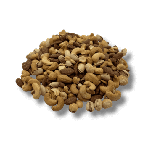 Pile of gourmet mixed nuts including cashews, almonds, pistachios, and seeds